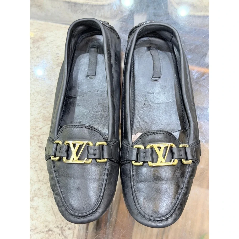 Louis Vuitton Black Leather Loafers Gold LV Logo Driving Shoes Womens Italy 39